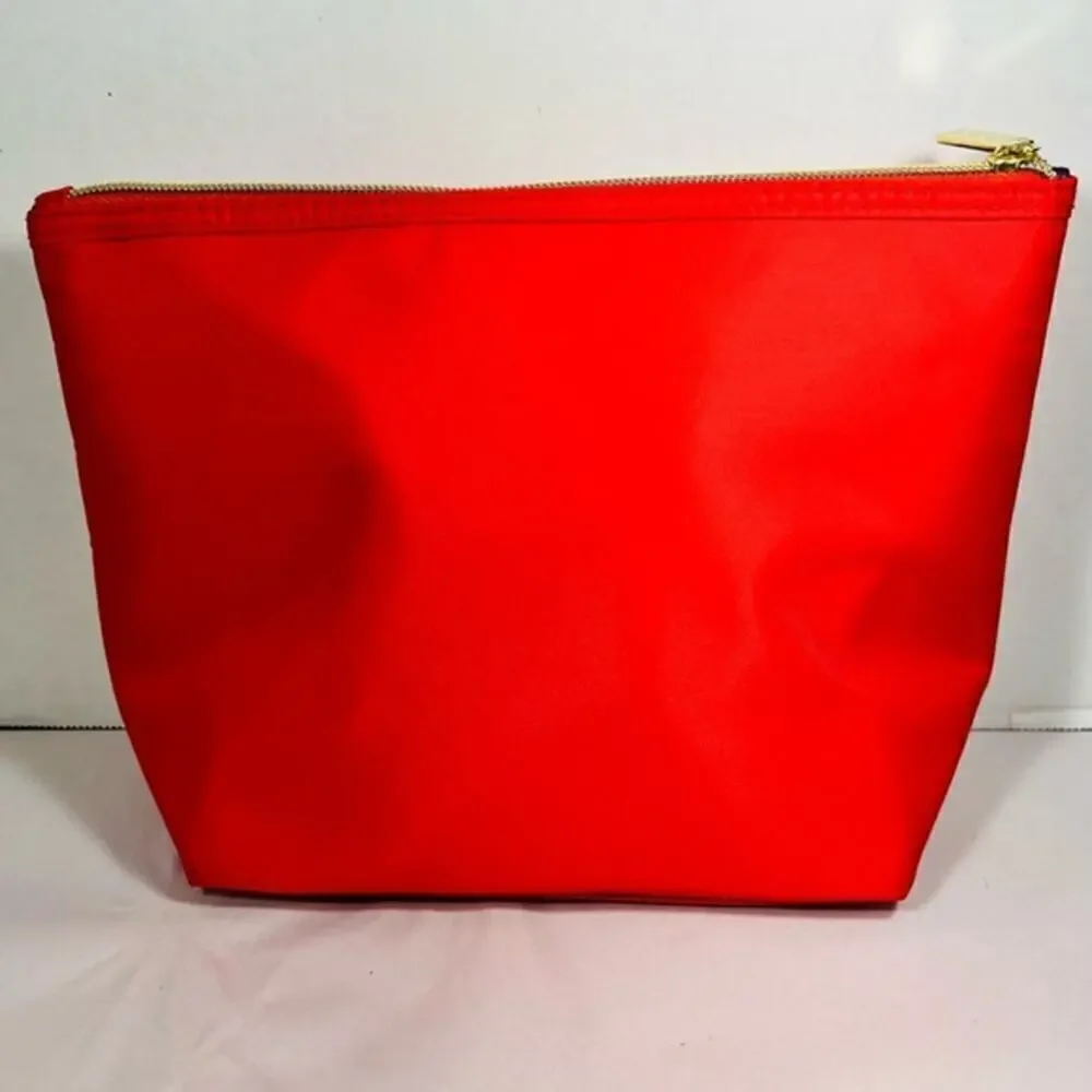 Tarte red cosmetic bag/ clutch, nice size with beautiful purple satin interior